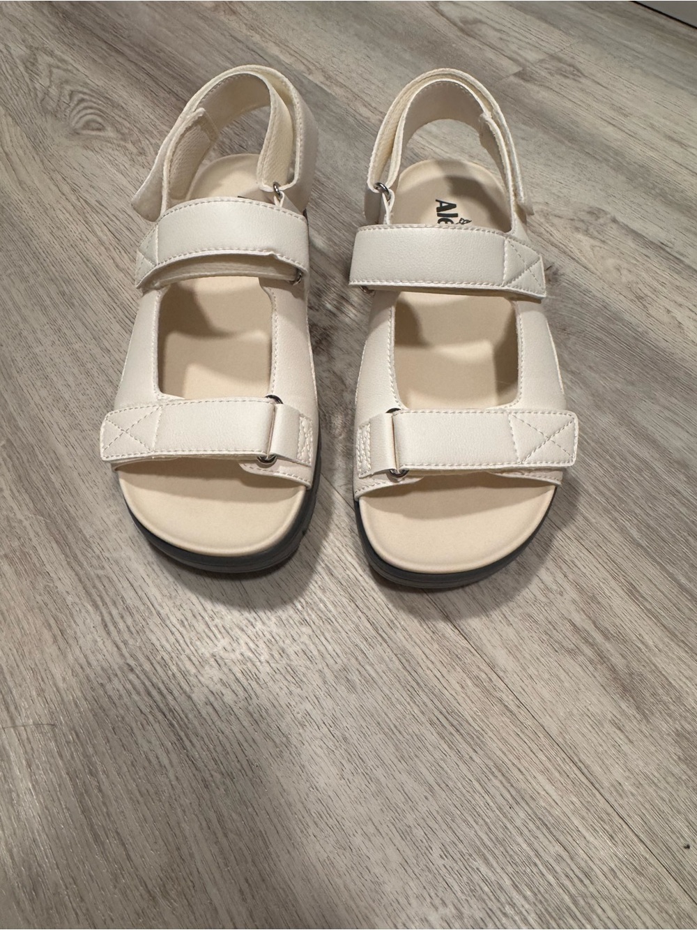 Henlee sandal by Alegria in cream and white